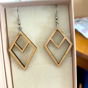 Cute diamond shaped earrings made from wood.